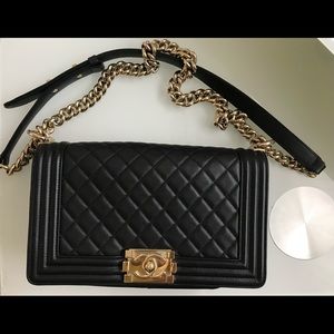 Sold Chanel black lambskin Old Medium Boy bag, gold hardware